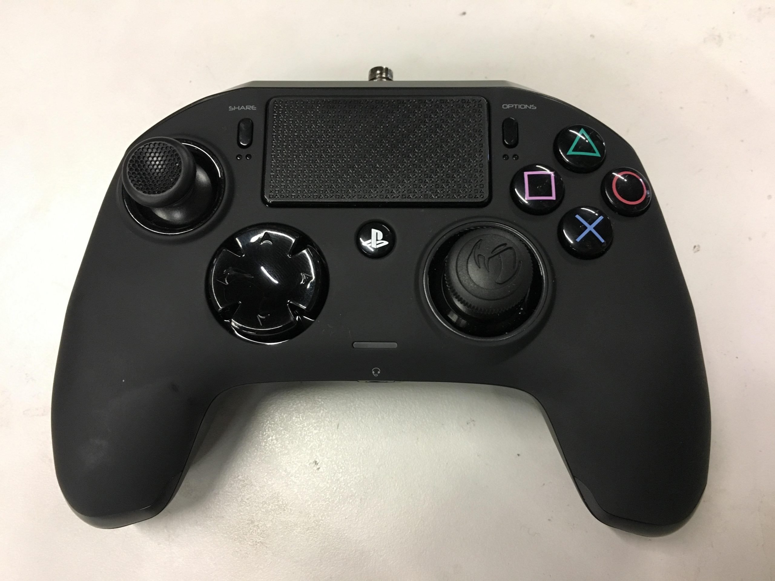A PS4 controller designed like an Xbox controller : mildlyinteresting
