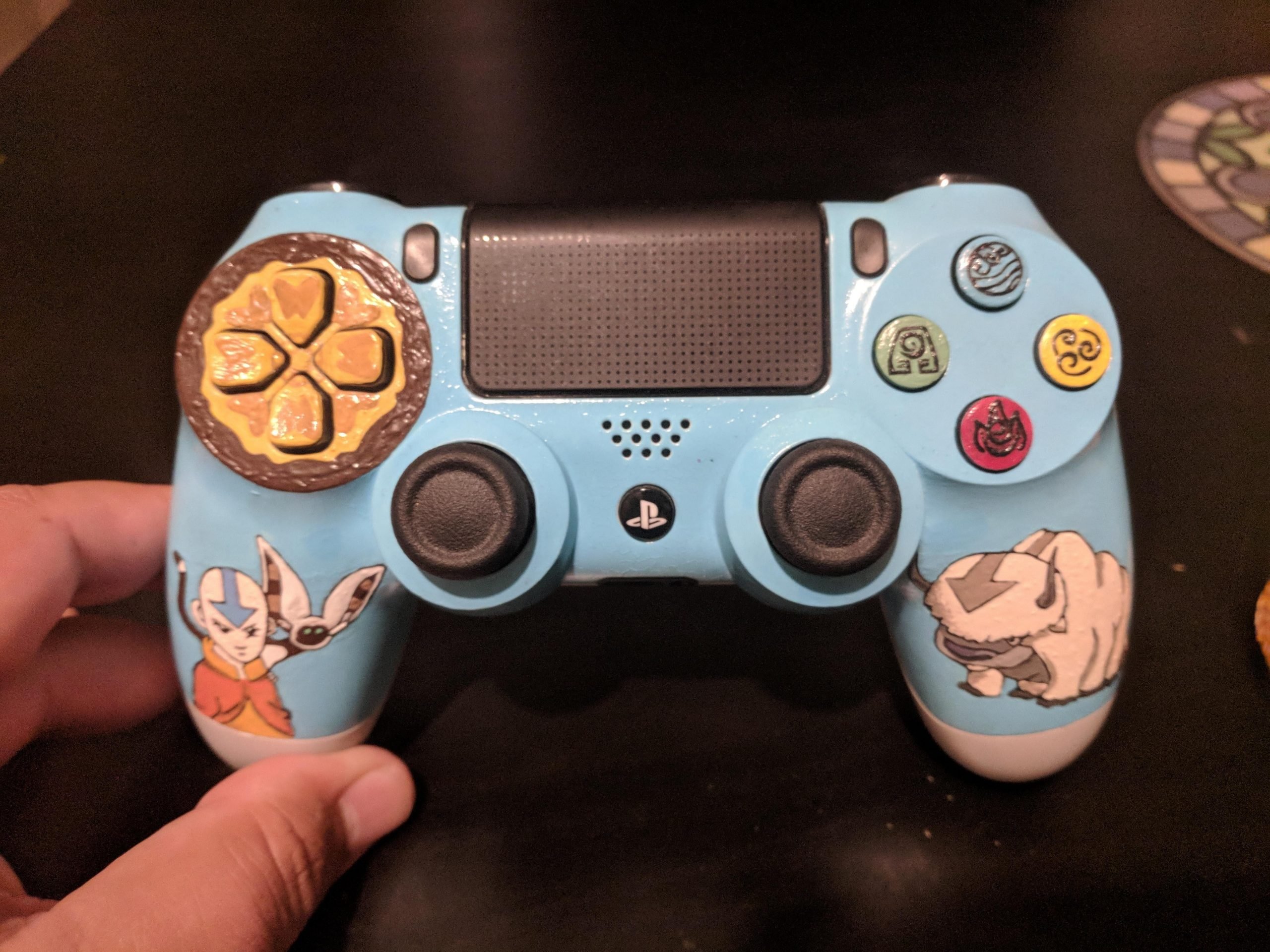 Check out my custom painted Avatar PS4 Controller ...